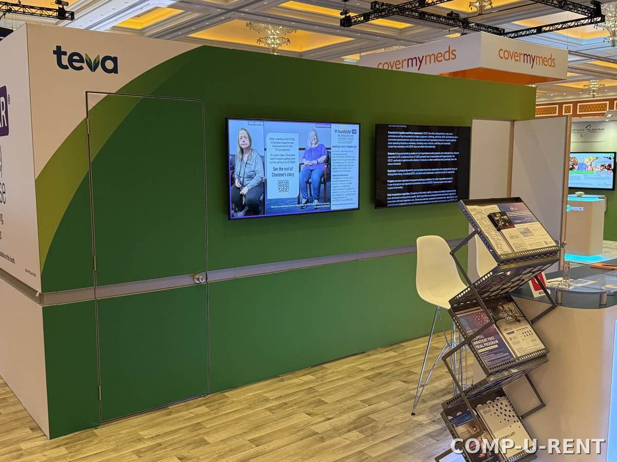 Large TV display wall at a trade show booth