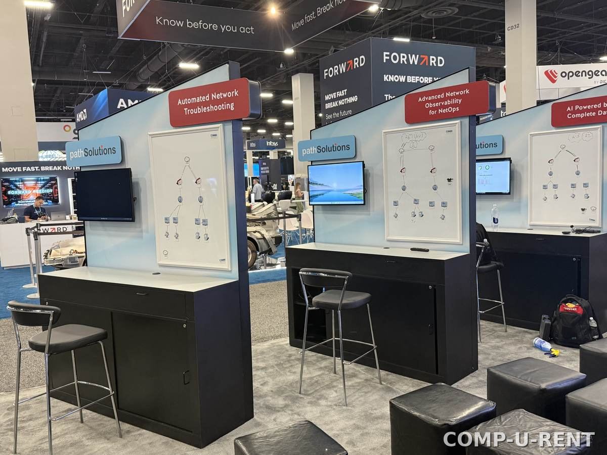 Multiple TV displays set up for a booth presentation