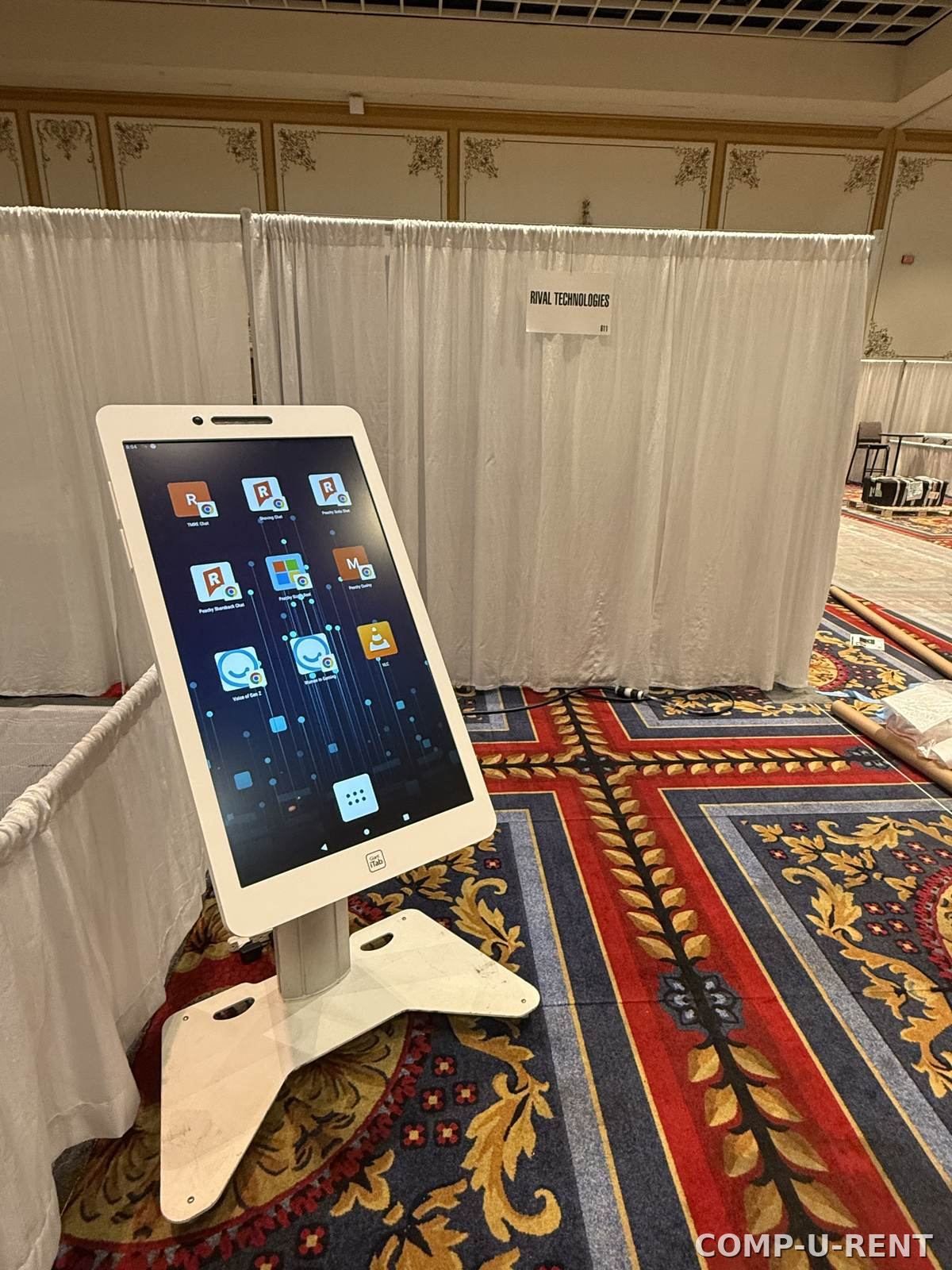 Touch screen kiosk display at a convention booth