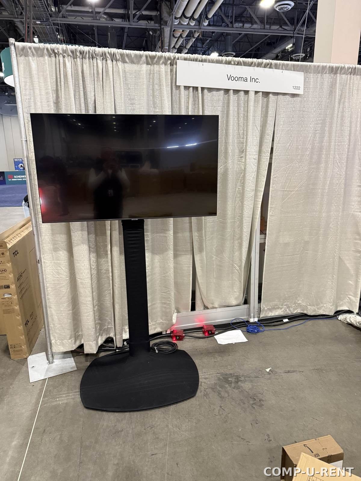 TV rental on a stand at a trade show booth