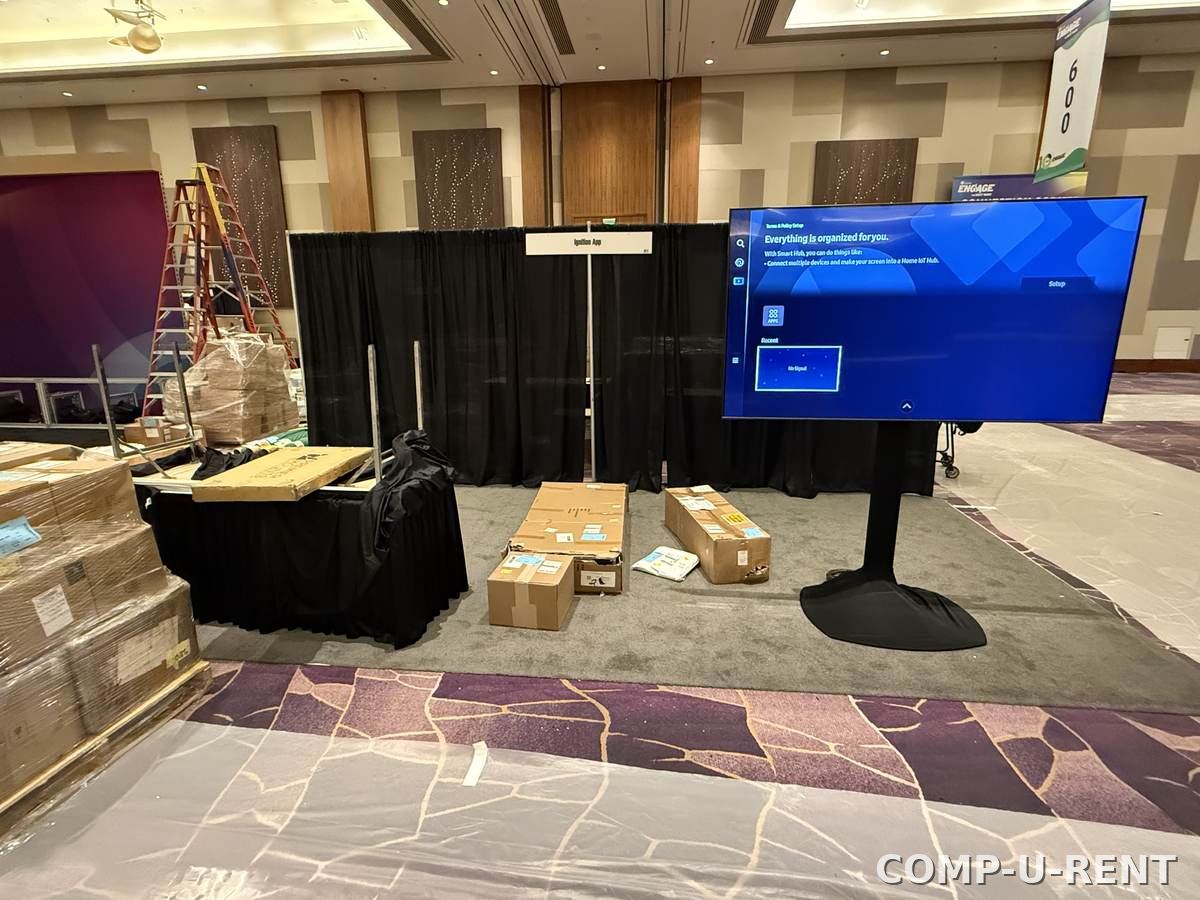 TV rental setup being staged at a convention booth